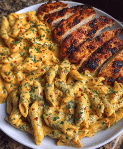 Garlic Parmesan Chicken Penne in Creamy Cajun Three-Cheese Sauce