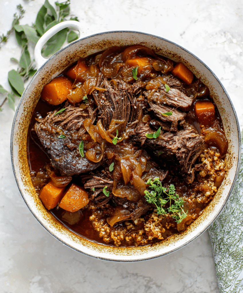 Cider Braised Pot Roast with Caramelized Onions and Cauliflower Rice.